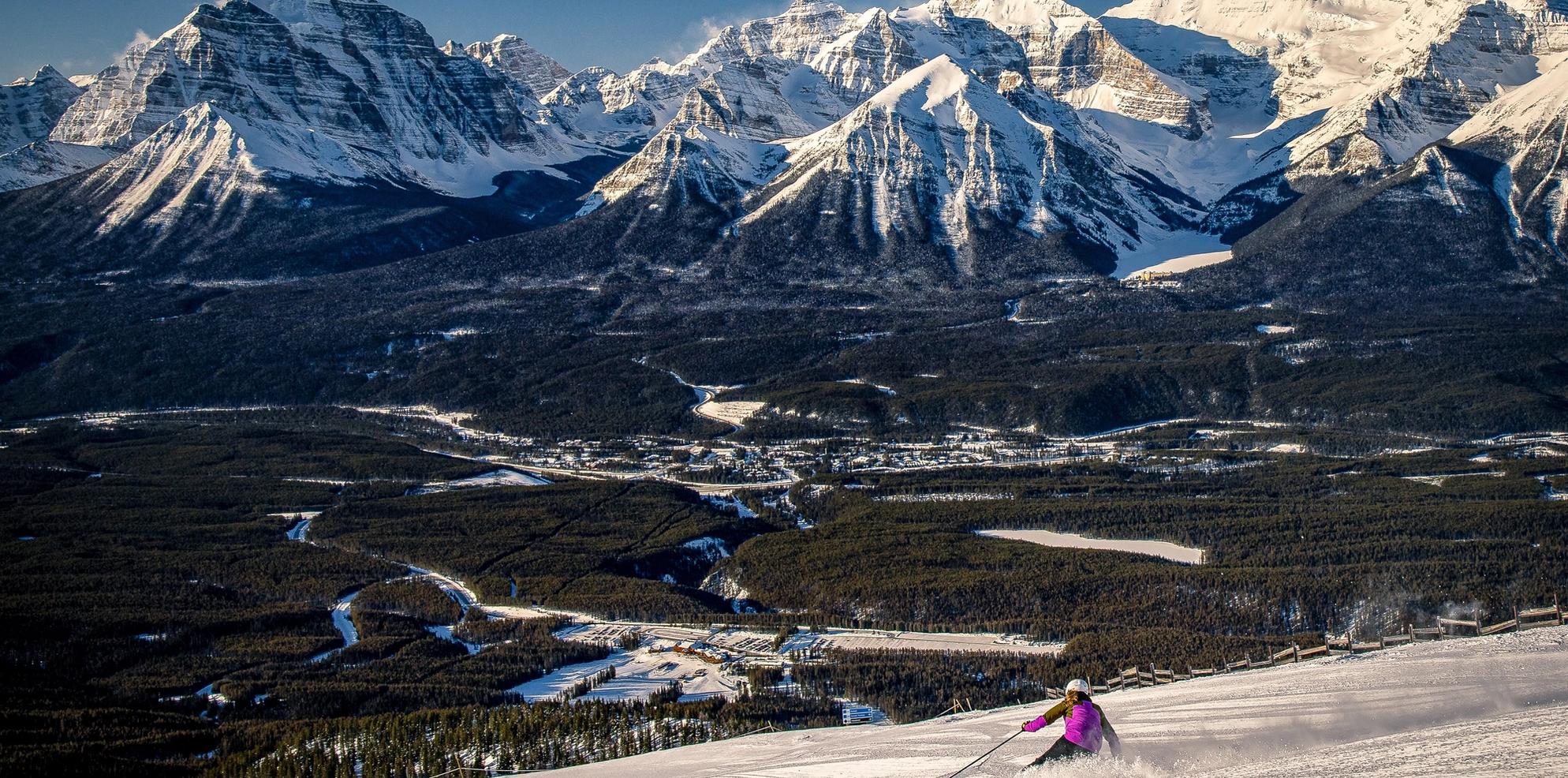 Downhill skier at Lake Louise Ski Resort in Banff National Park.