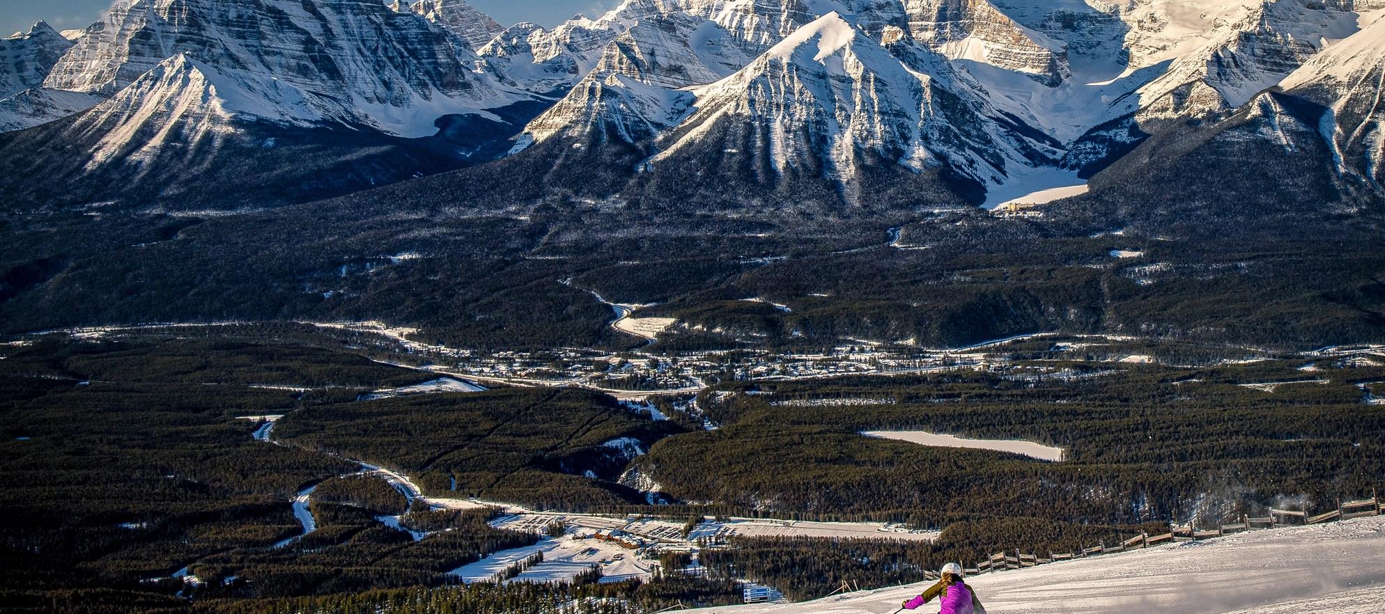 Downhill skier at Lake Louise Ski Resort in Banff National Park.