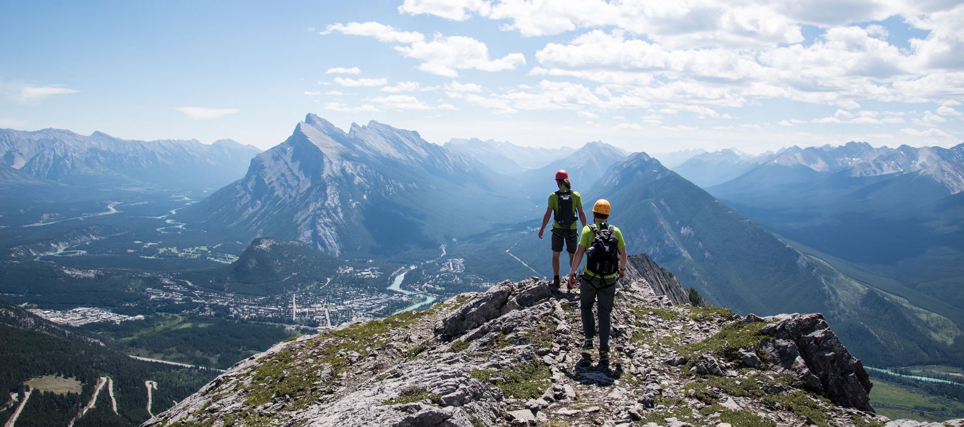 Climbers reach the summit of the Mt. Norquay Via Ferrata, Banff National Park, AB