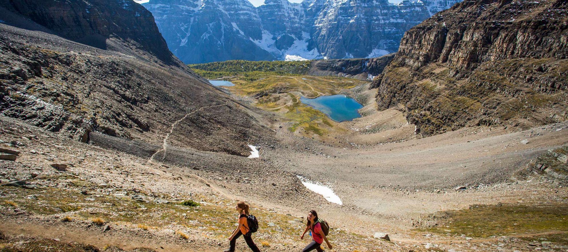 Hikers explore the stunning Sentinel Pass outside of Moraine Lake, AB.