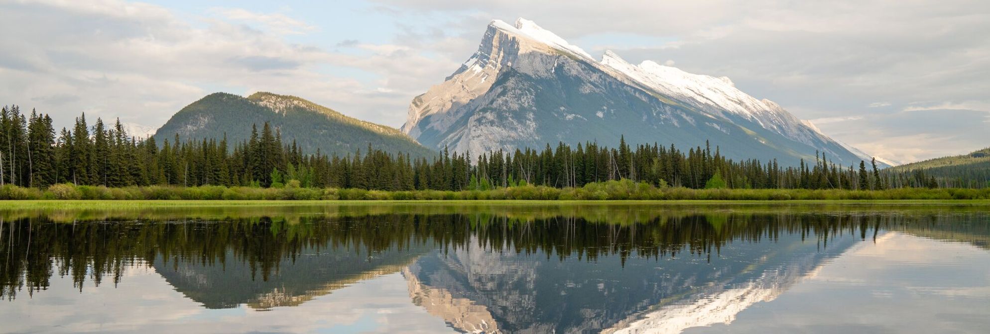 Views of Rundle Mountain and Tunnel Mountain from Vermillion Lakes in Banff National Park.