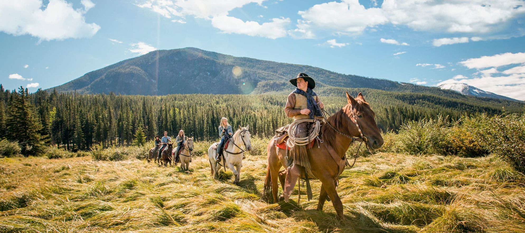 Horseback riding through Banff National Parks stunning high country is the perfect way to see glaciers, emerald lakes, and towering mountains perched atop your horse.