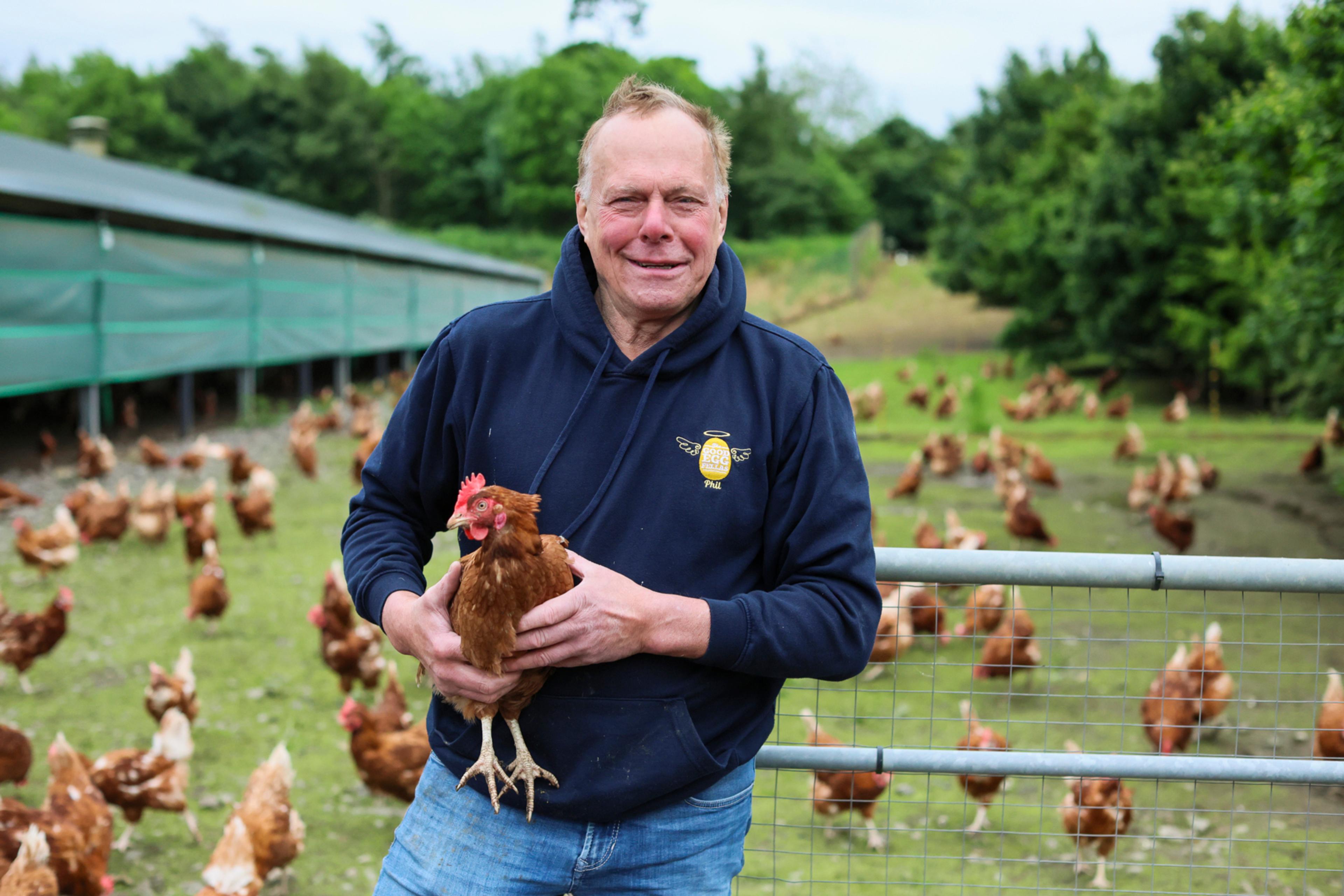 RSPCA Assured hen farmer with higher welfare hen