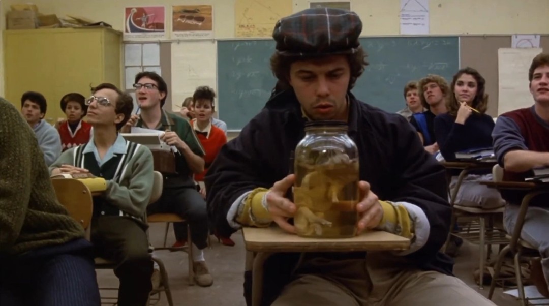 Charles De Mar talks to his preserved pig.