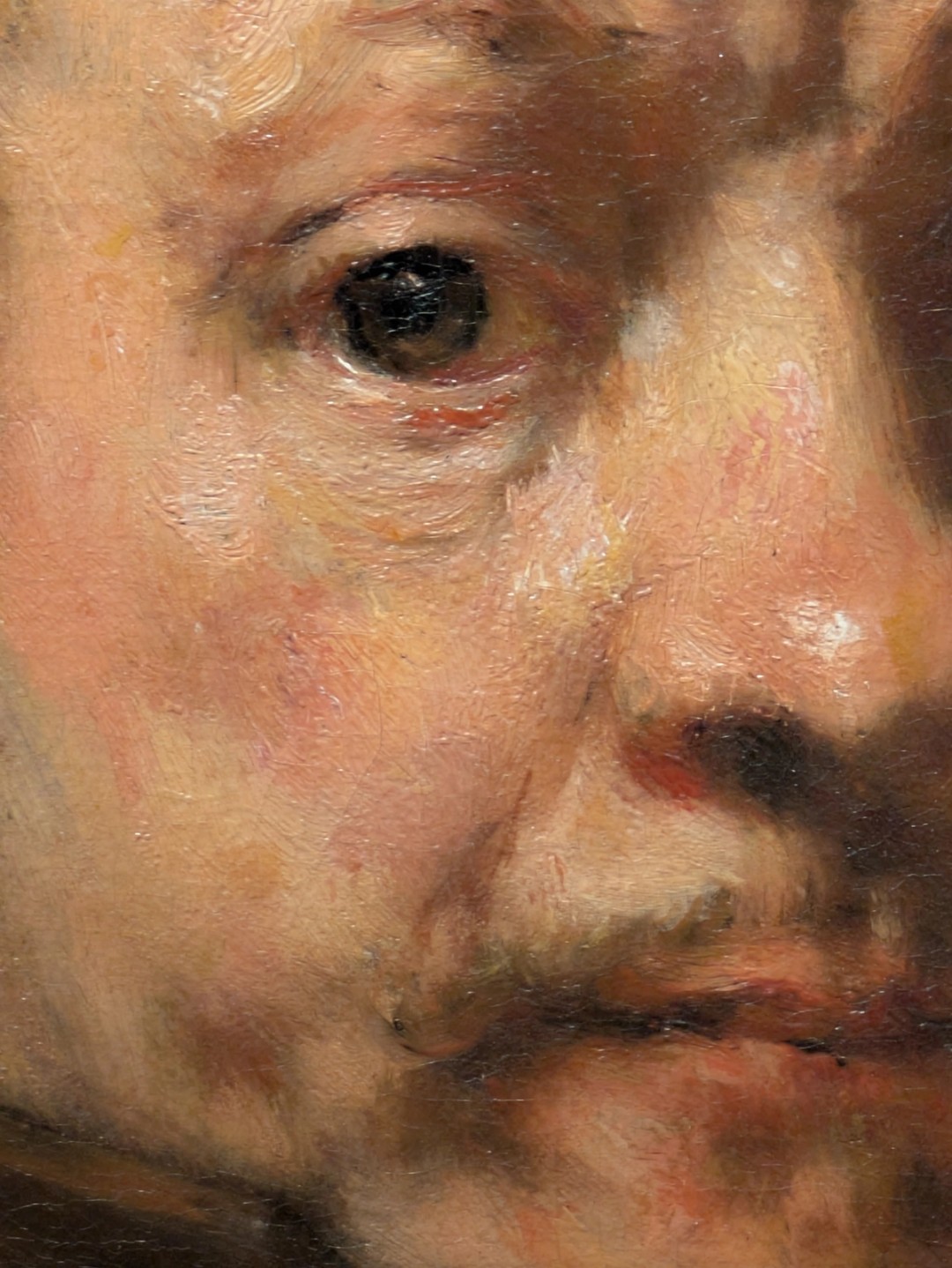 A close up of Rembrandt's self portrait in oil paint from 1660