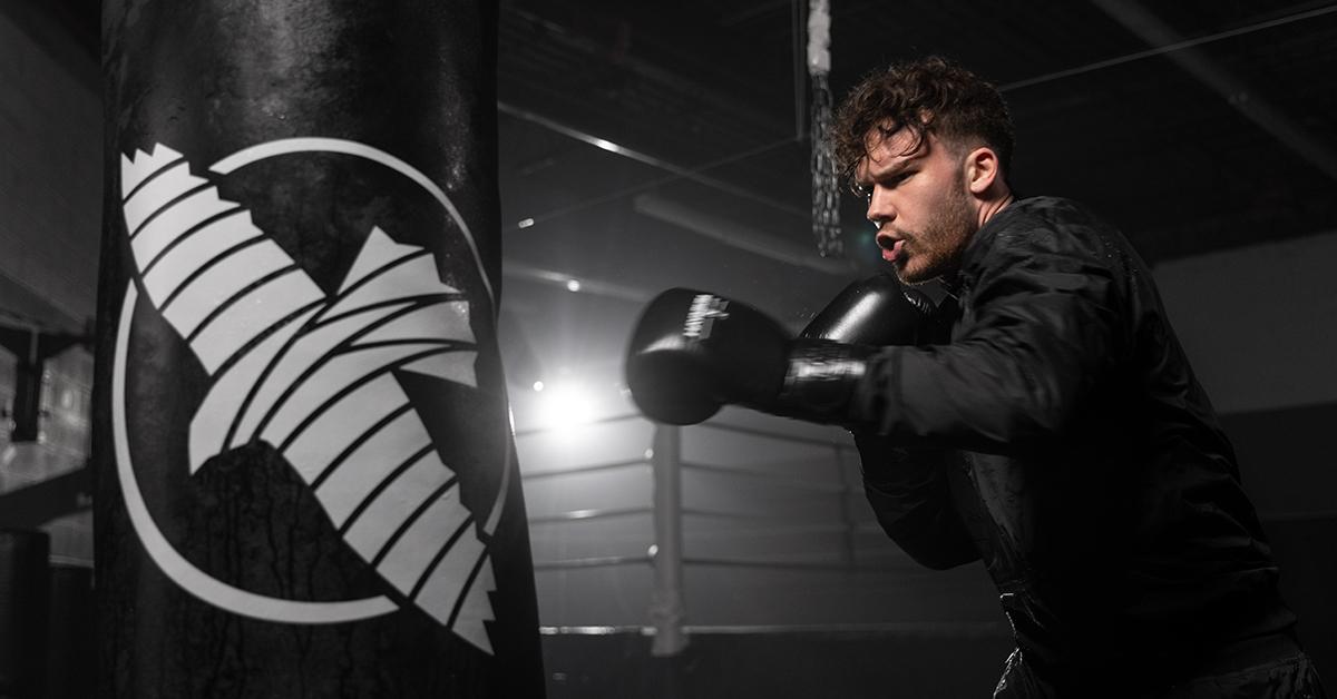 Hayabusa hooded sauna suit for performance and weight loss, highlighting sauna suit benefits