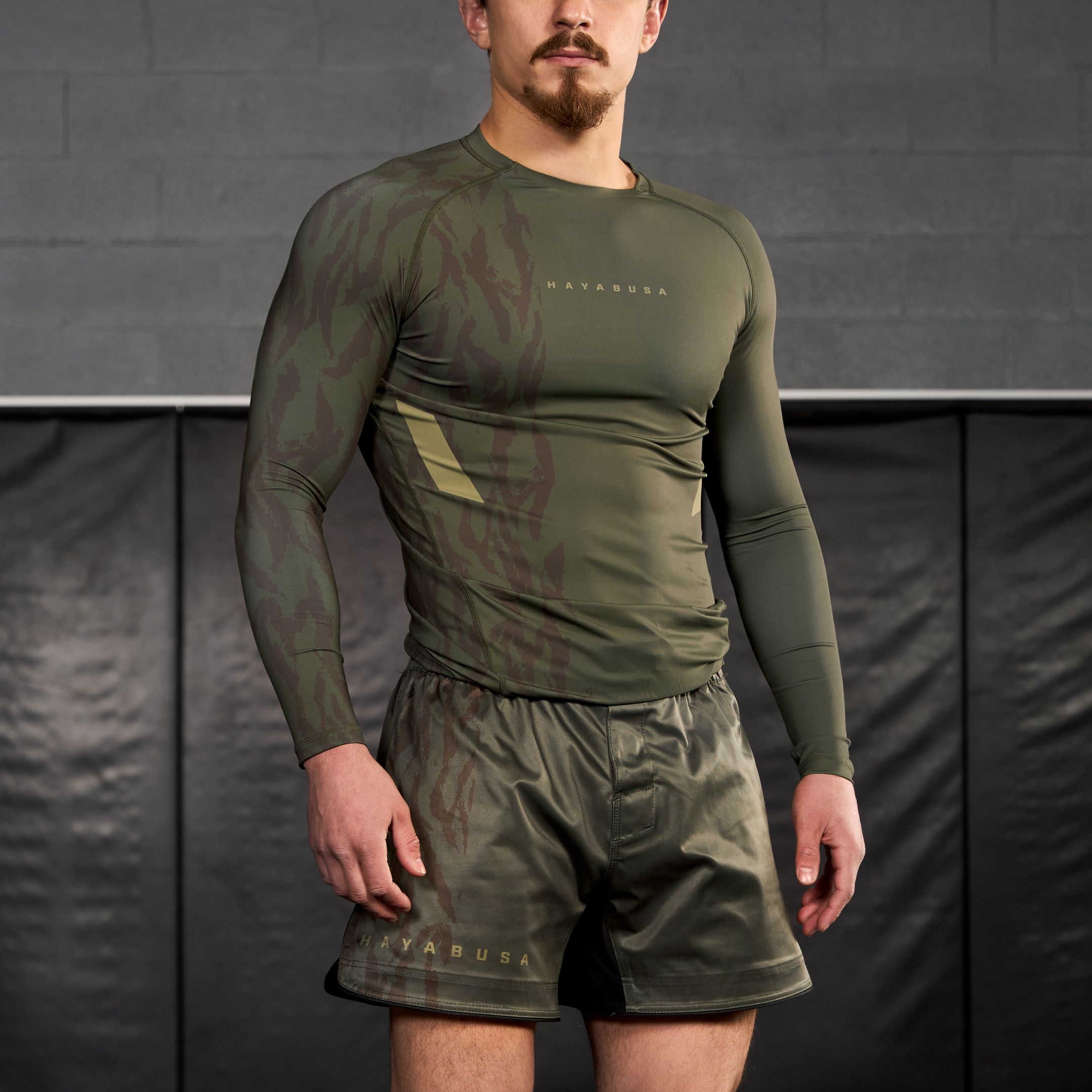 Man Wearing Hayabusa Apex Long Sleeve Rash Guard – Green Training Gear