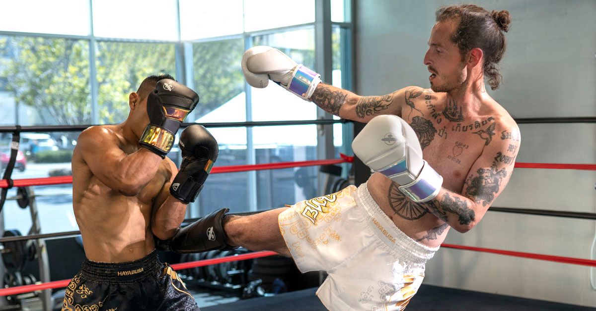 muay thai shin guards as a key gear for kickboxing that ensures safety during intense training.