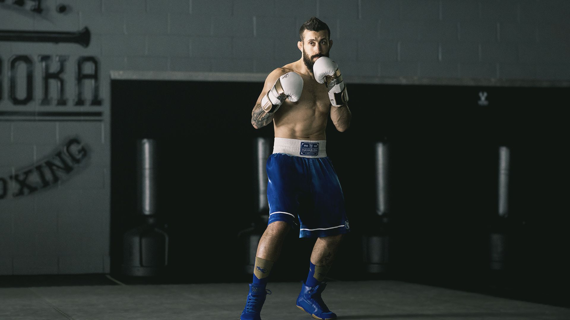 Reinforced stitching ensures durability, while wide leg openings offer mobility for fighting