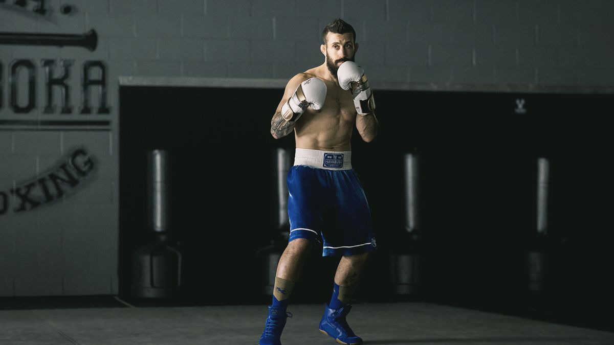 Reinforced stitching ensures durability, while wide leg openings offer mobility for fighting