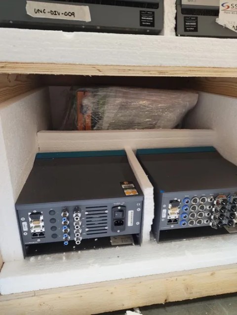 Rack-mounted electronics packed in foam-lined crating