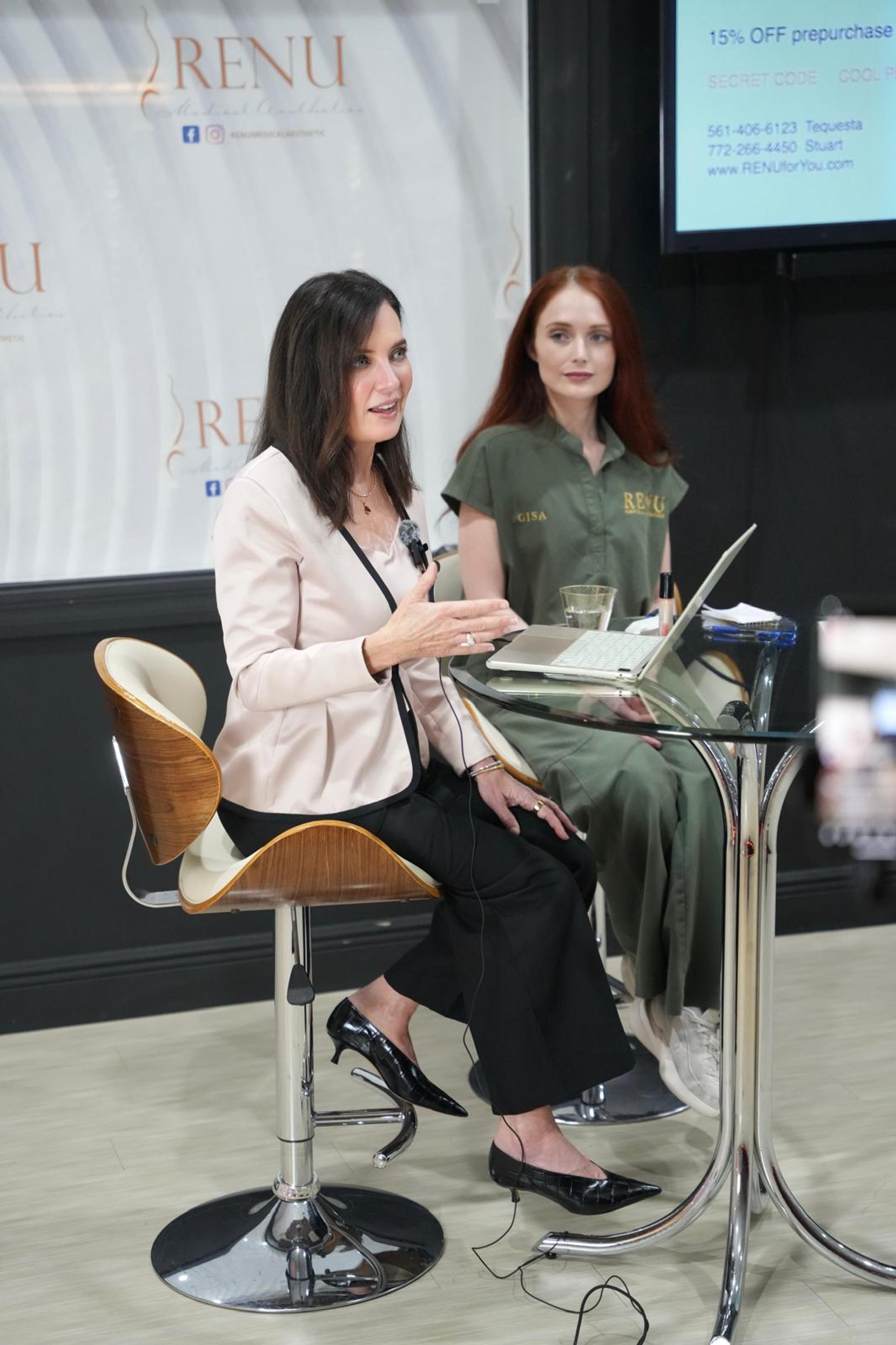 Dr. Valerie Barrett and a RENU team member at a patient event