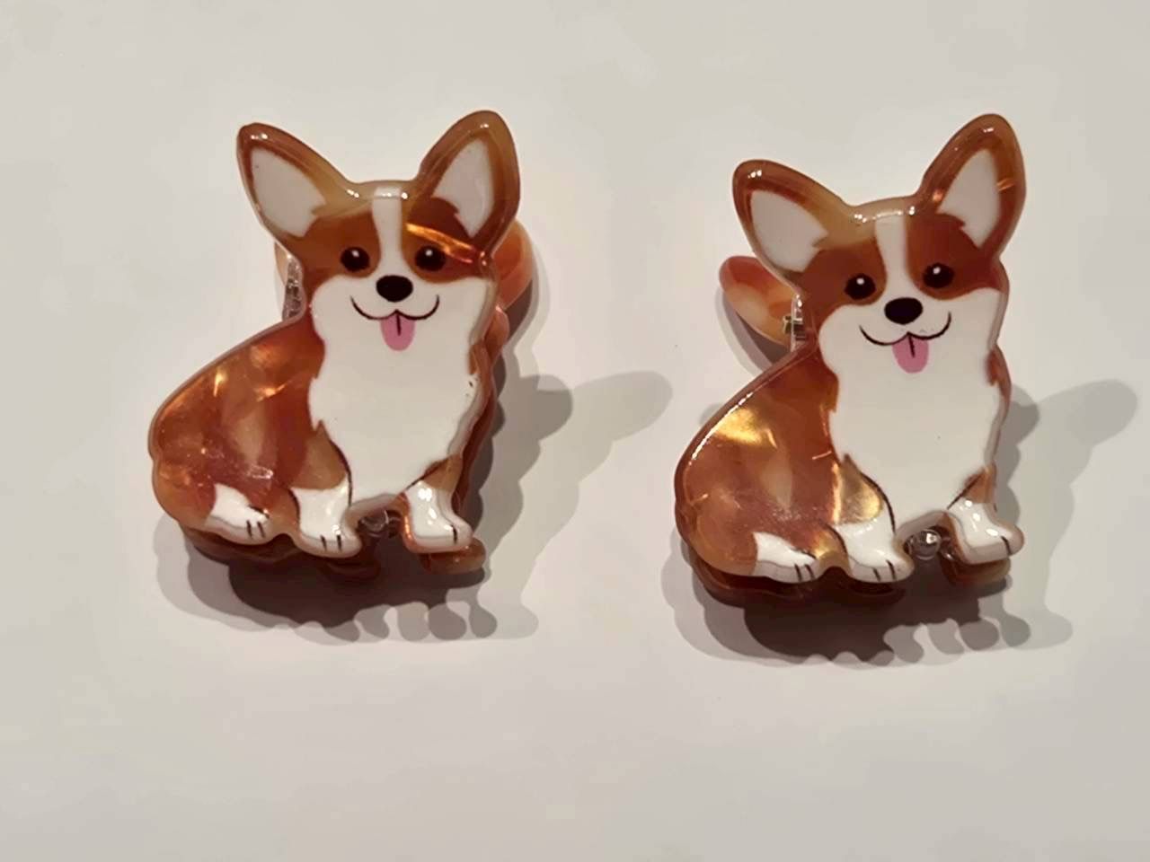 Pair of Corgi dog-shaped novelty stud earrings with a glossy brown and white resin finish