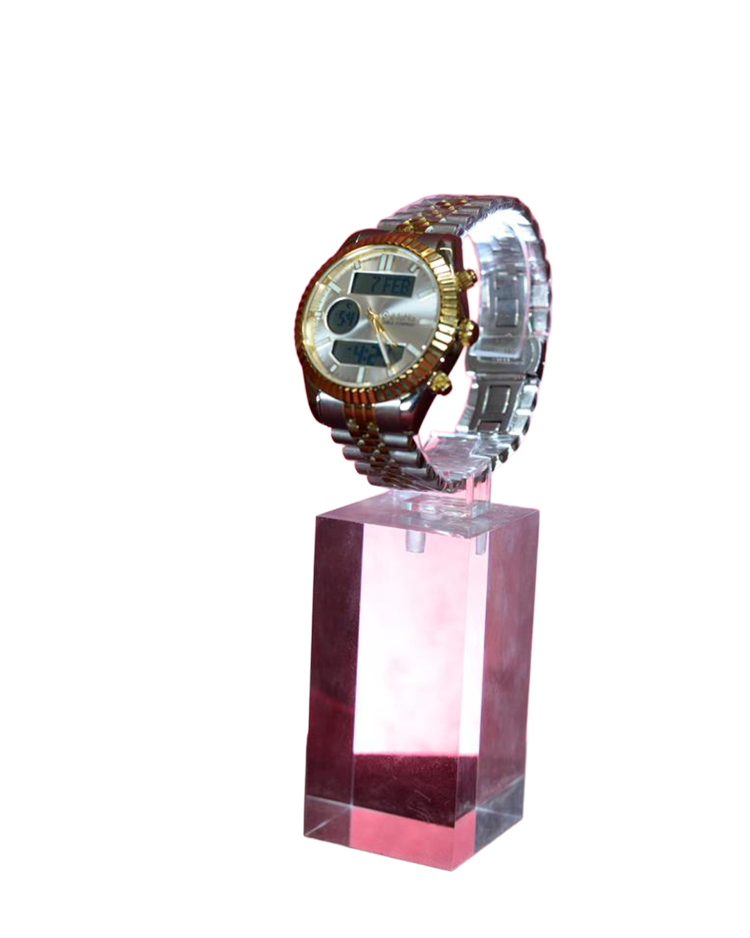A two-tone metallic (gold and silver) wristwatch featuring both analog and digital displays, presented on a clear pink acrylic display stand.
