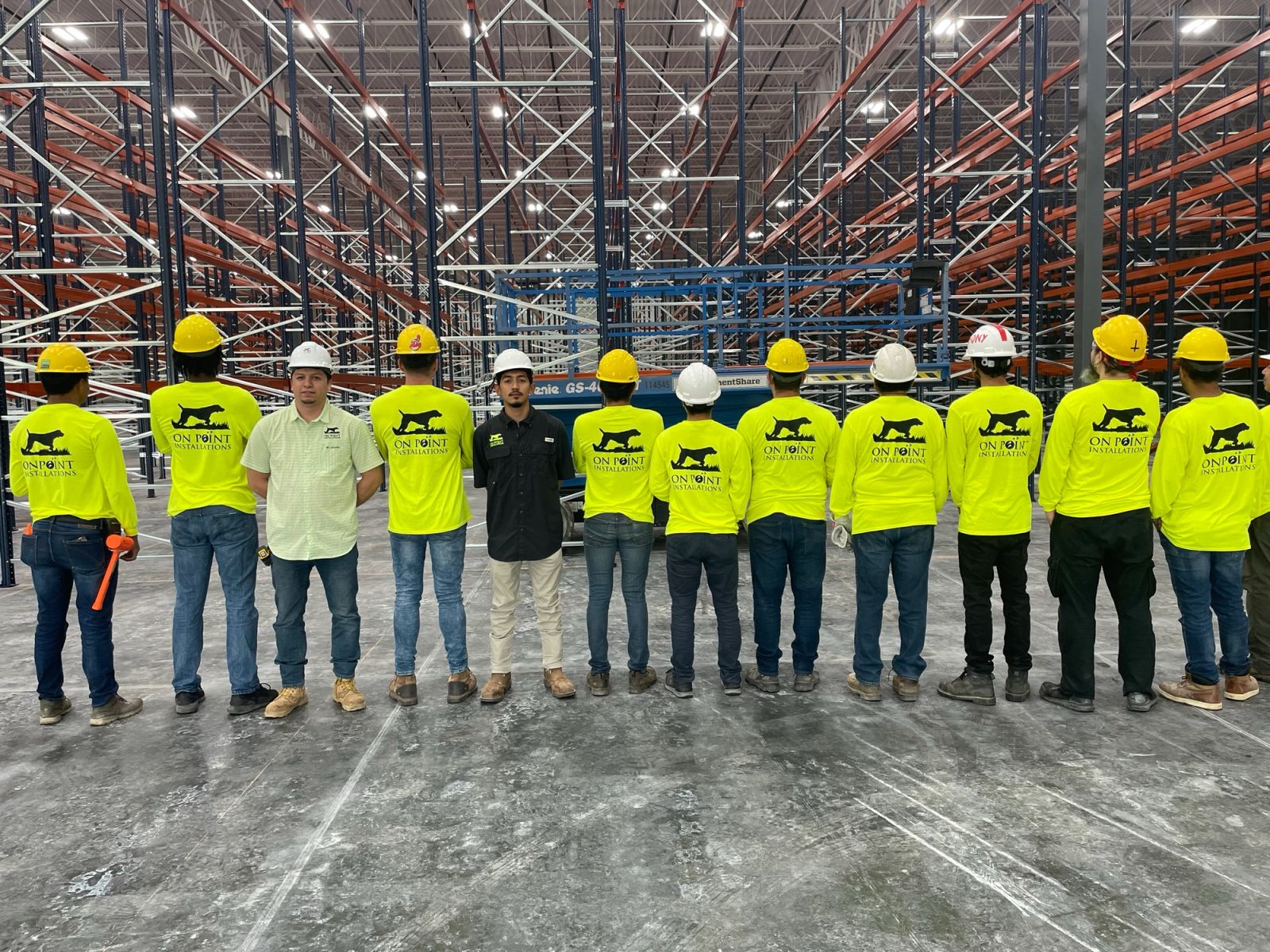 On Point Installations crew on a warehouse job site