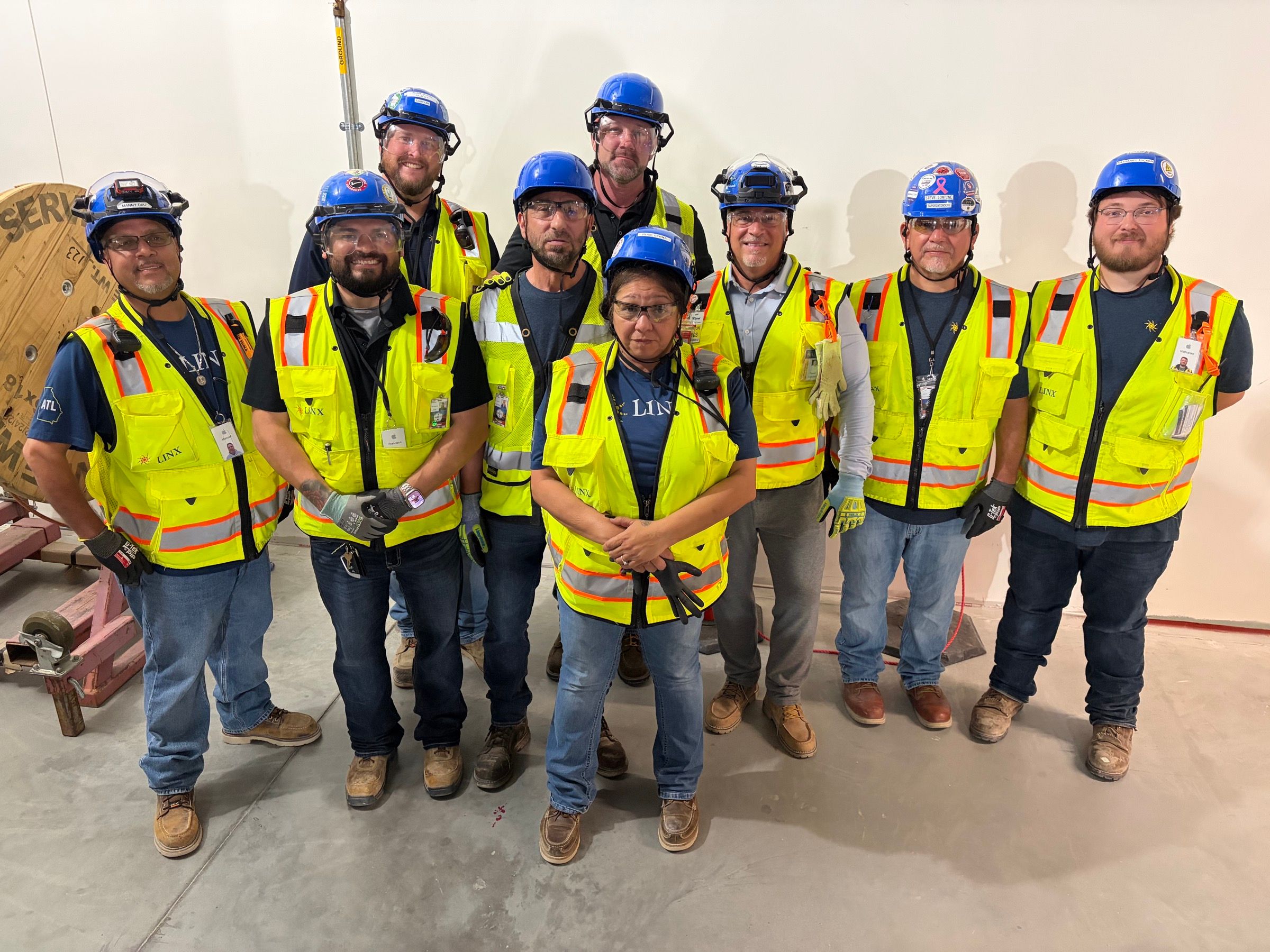 LINX field crew in hard hats and safety vests at a job site