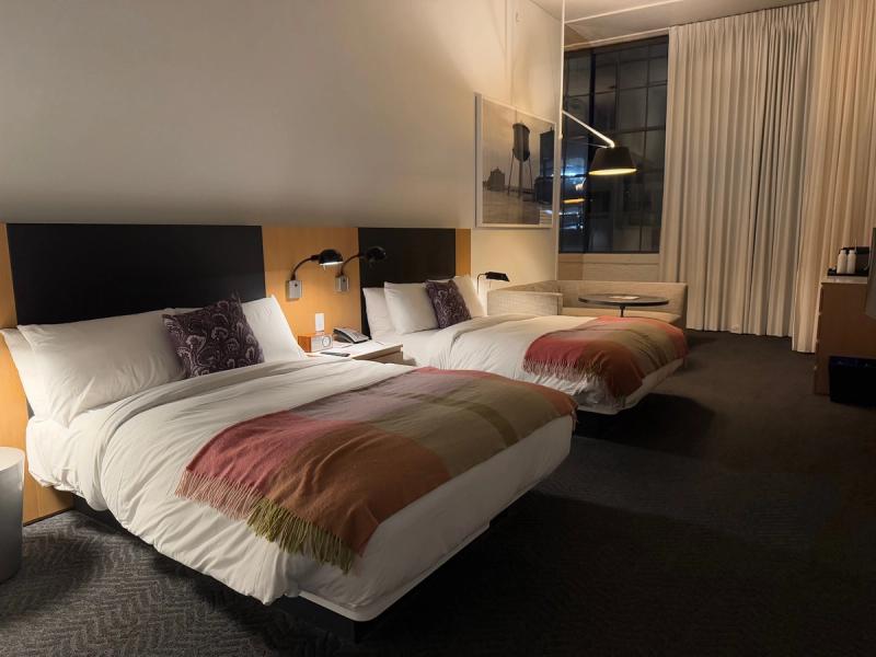 How do we evaluate the “total value” of a hotel’s room block offer?