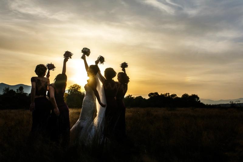 How many rooms do hotels require at minimum to qualify as a wedding group?
