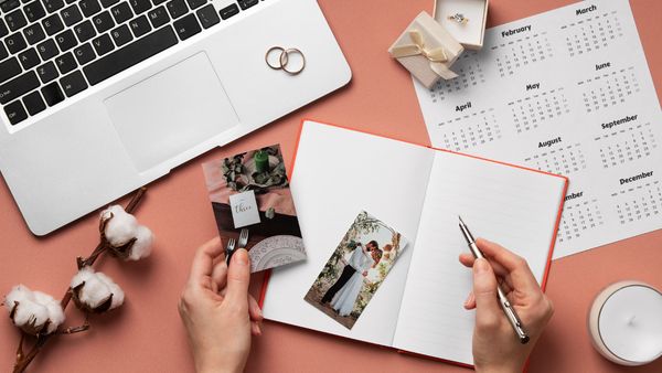 When should we notify guests about the room block on our wedding website?