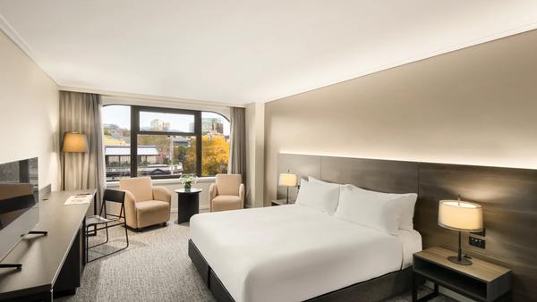 Should we pick hotels based on price range, amenities, or proximity?