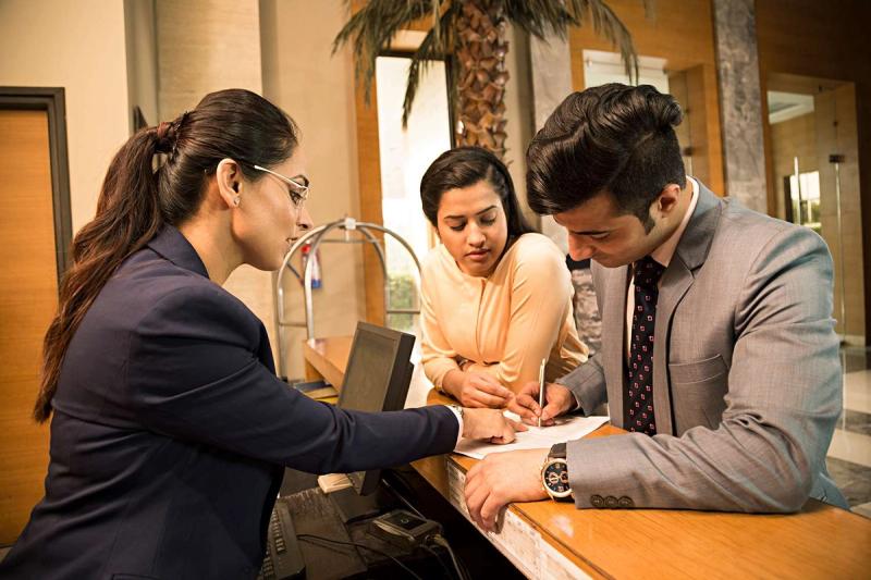 Do hotels require deposits for wedding room blocks?