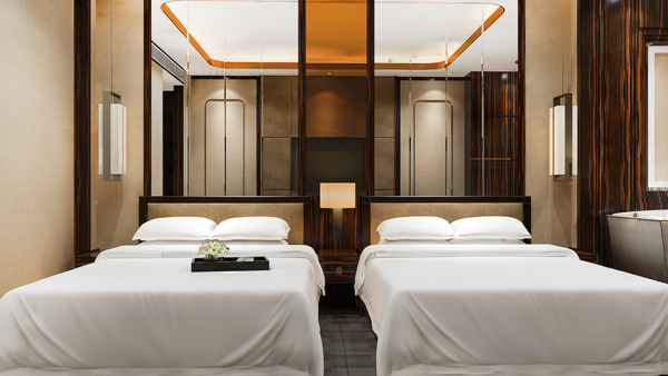 Can we request that the hotel hold a certain number of double-queen rooms?