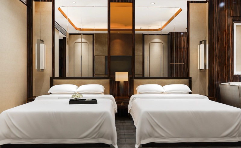 Can we request that the hotel hold a certain number of double-queen rooms?