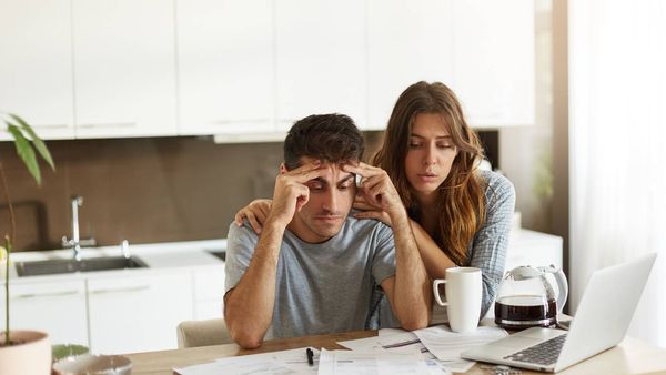 What happens if fewer guests book than expected during the room block reservation?