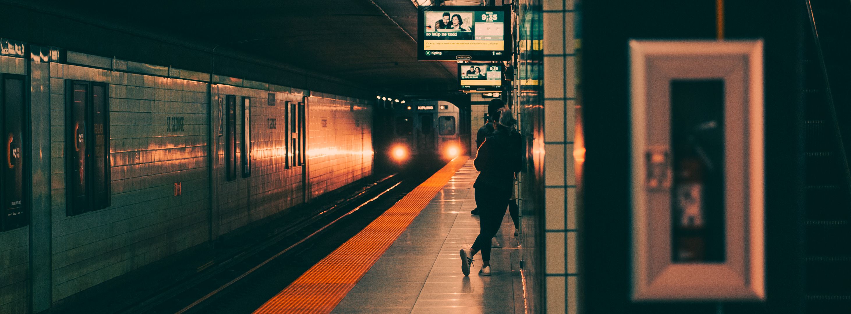 A person waiting for a subway train