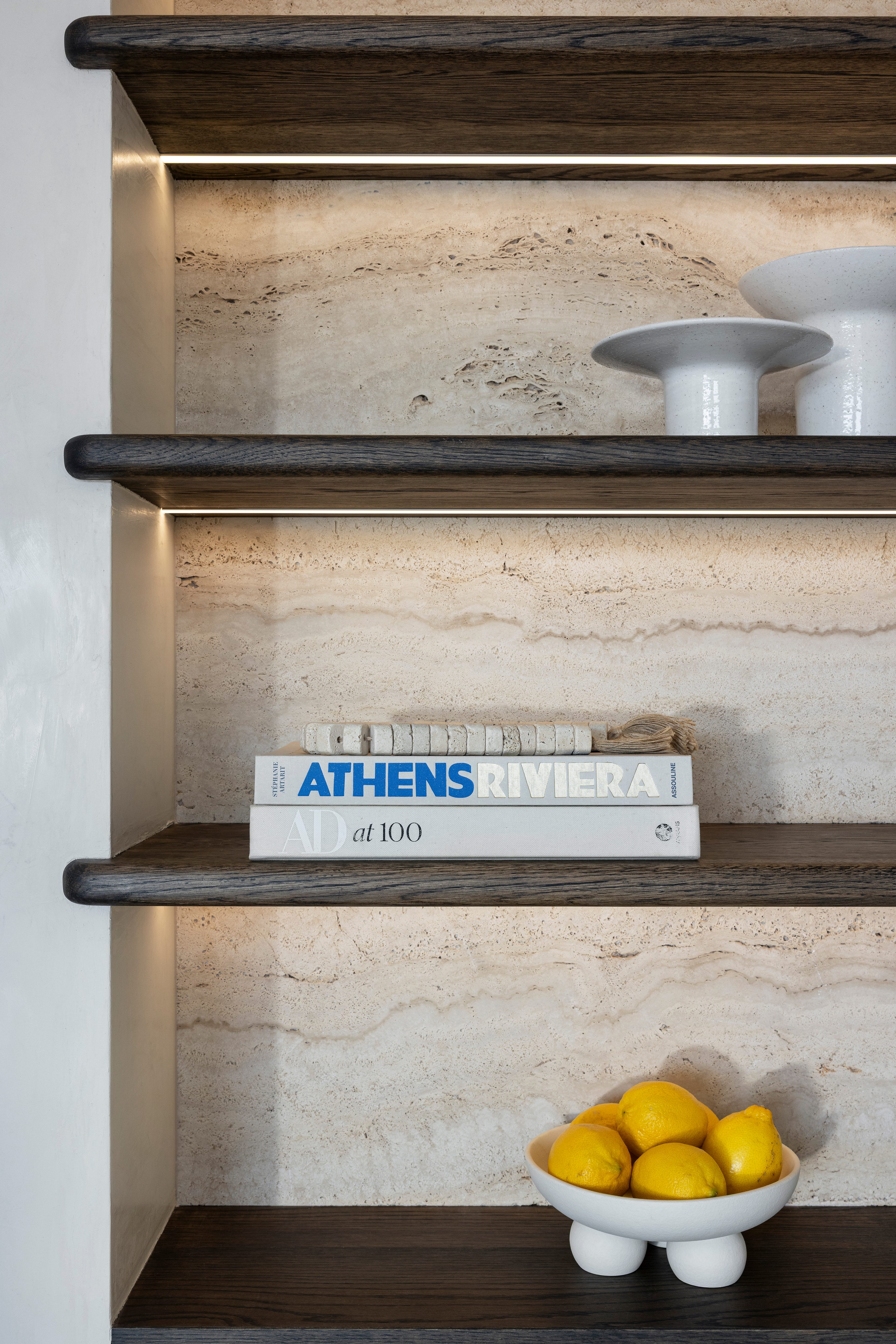 Shelving display with honed Travertine marble