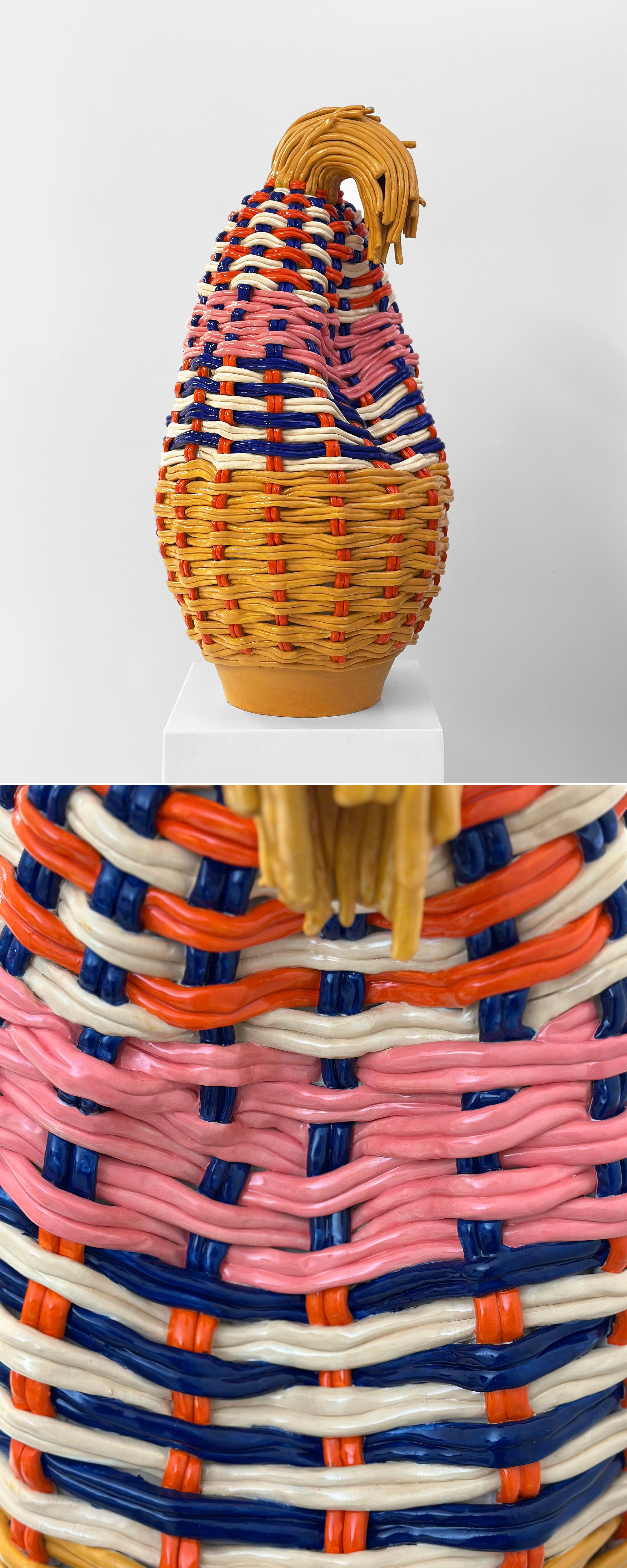 A yellow, orange, blue, white, and pink ceramic vessel with a woven texture sits on a white pedestal in front of a white background.; Close-up image showing the woven texture of the vessel.