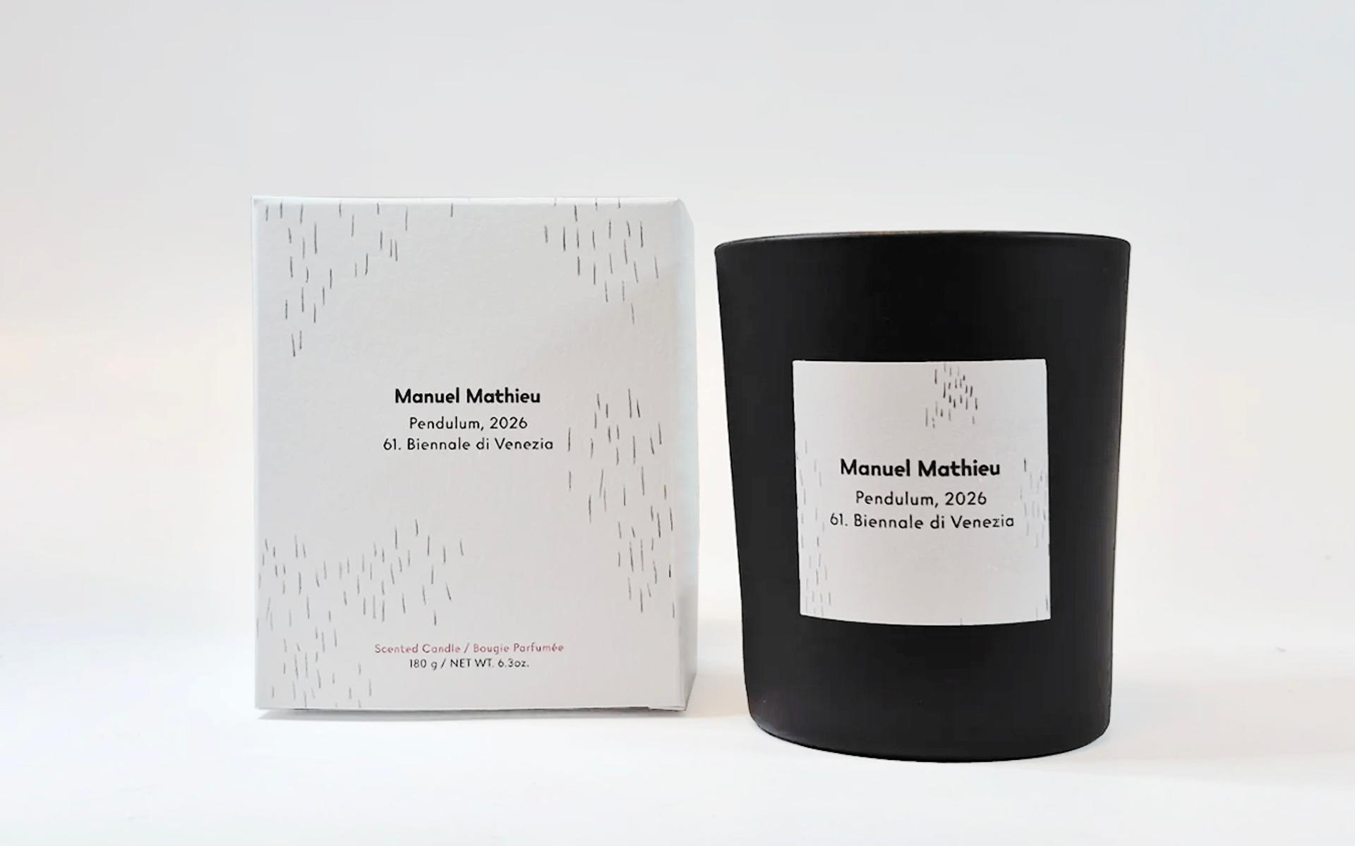Black glass candle and white box labeled “Manuel Mathieu, Pendulum, 2026, 61. Biennale di Venezia,” with minimalist black line pattern.