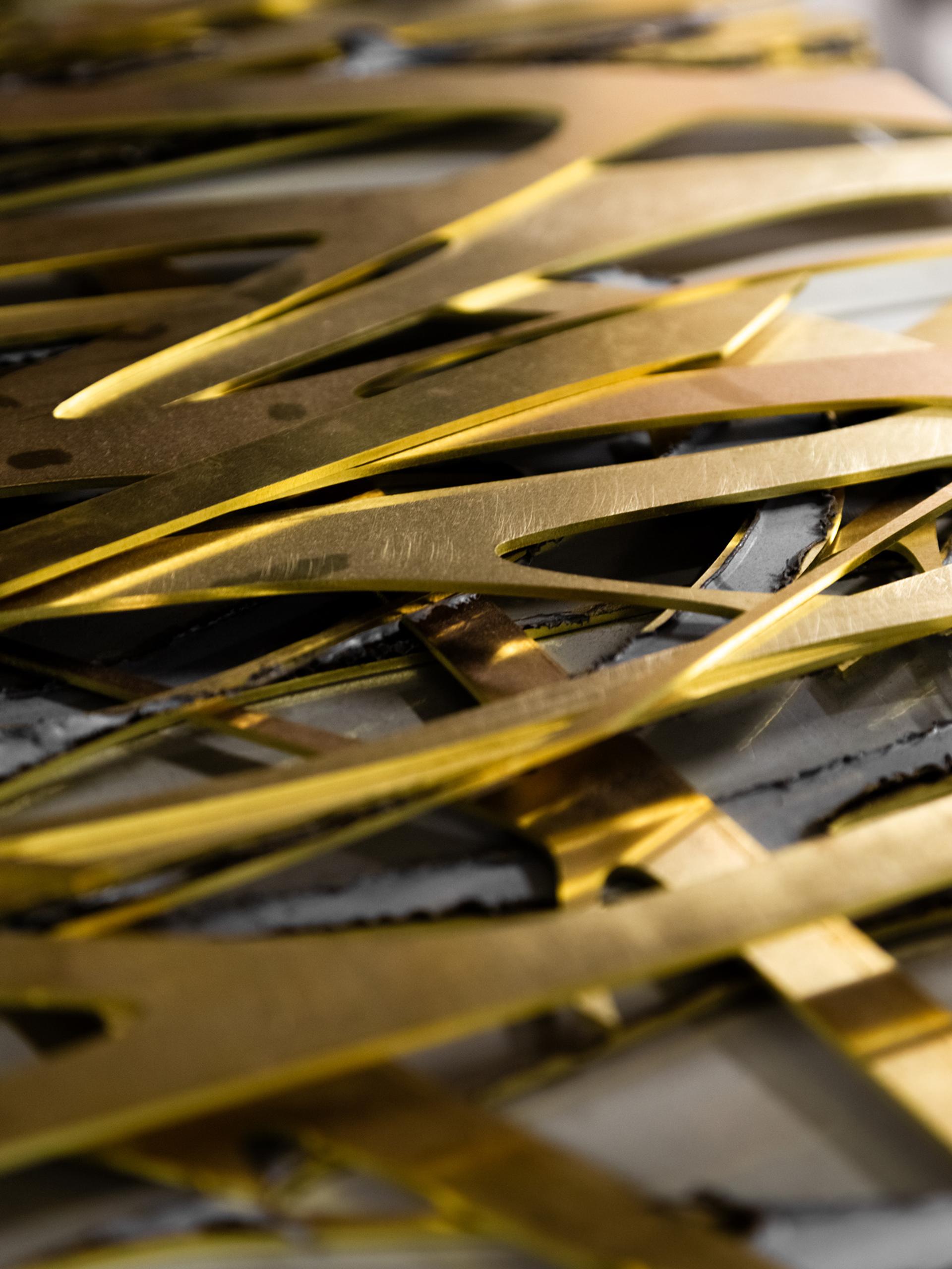 Close-up photo of metal detailing for a custom La Marzocco coffee machine.