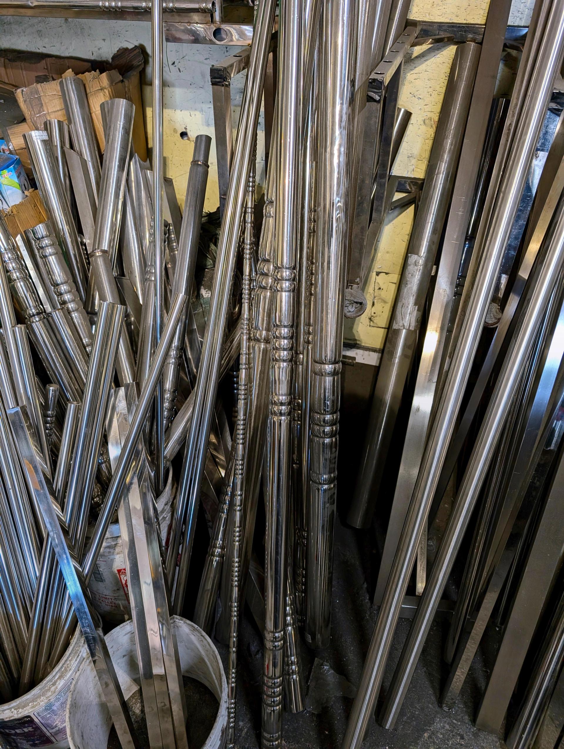 Bundles of stainless steel cylinders stored in the Brooklyn Stainless Steel workshop.