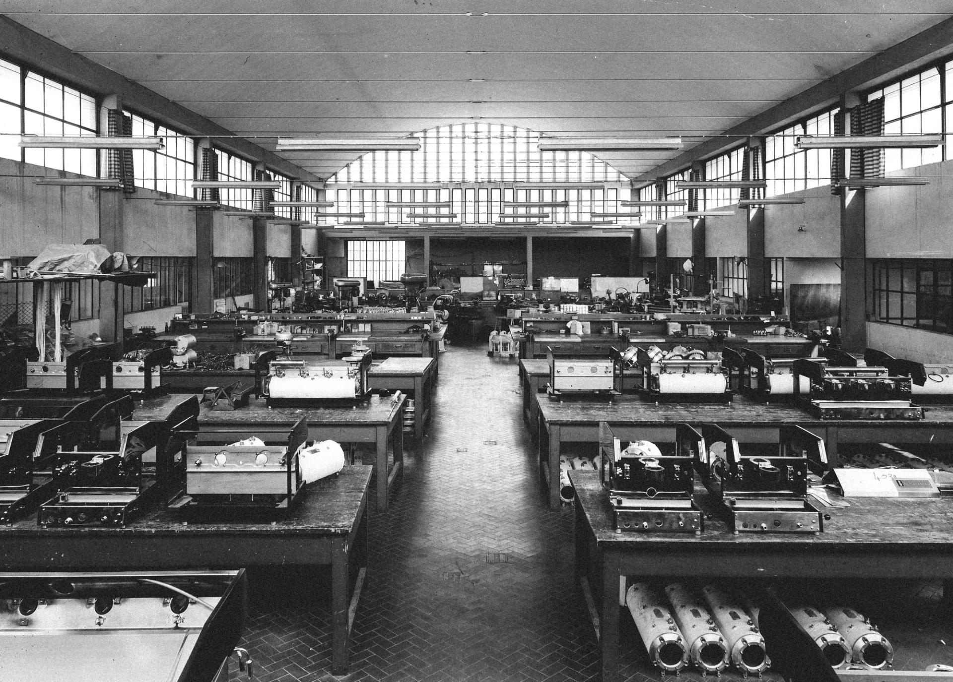 Black and white photo of the factory floor.