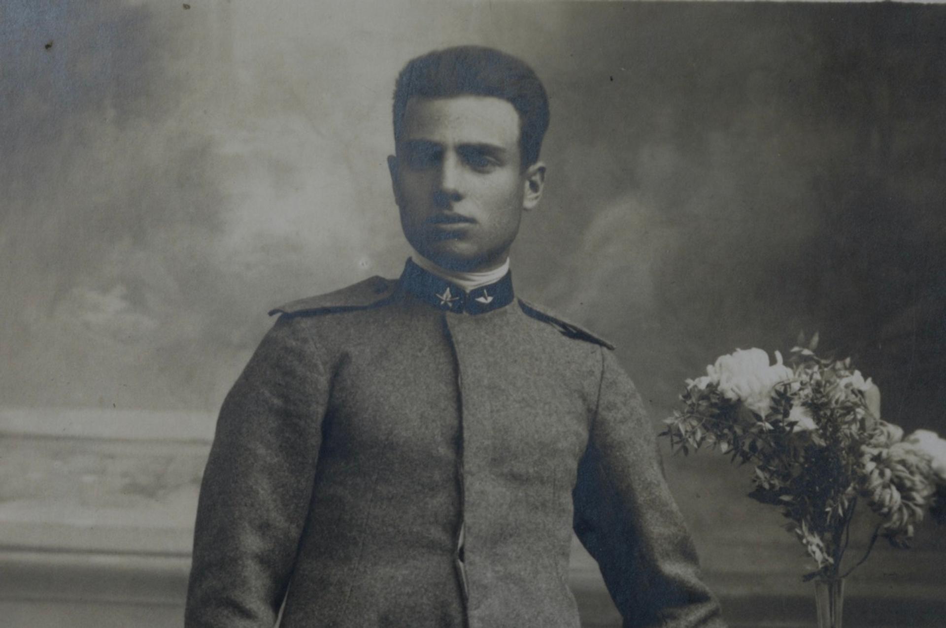 black-and-white photo of a man in a military uniform