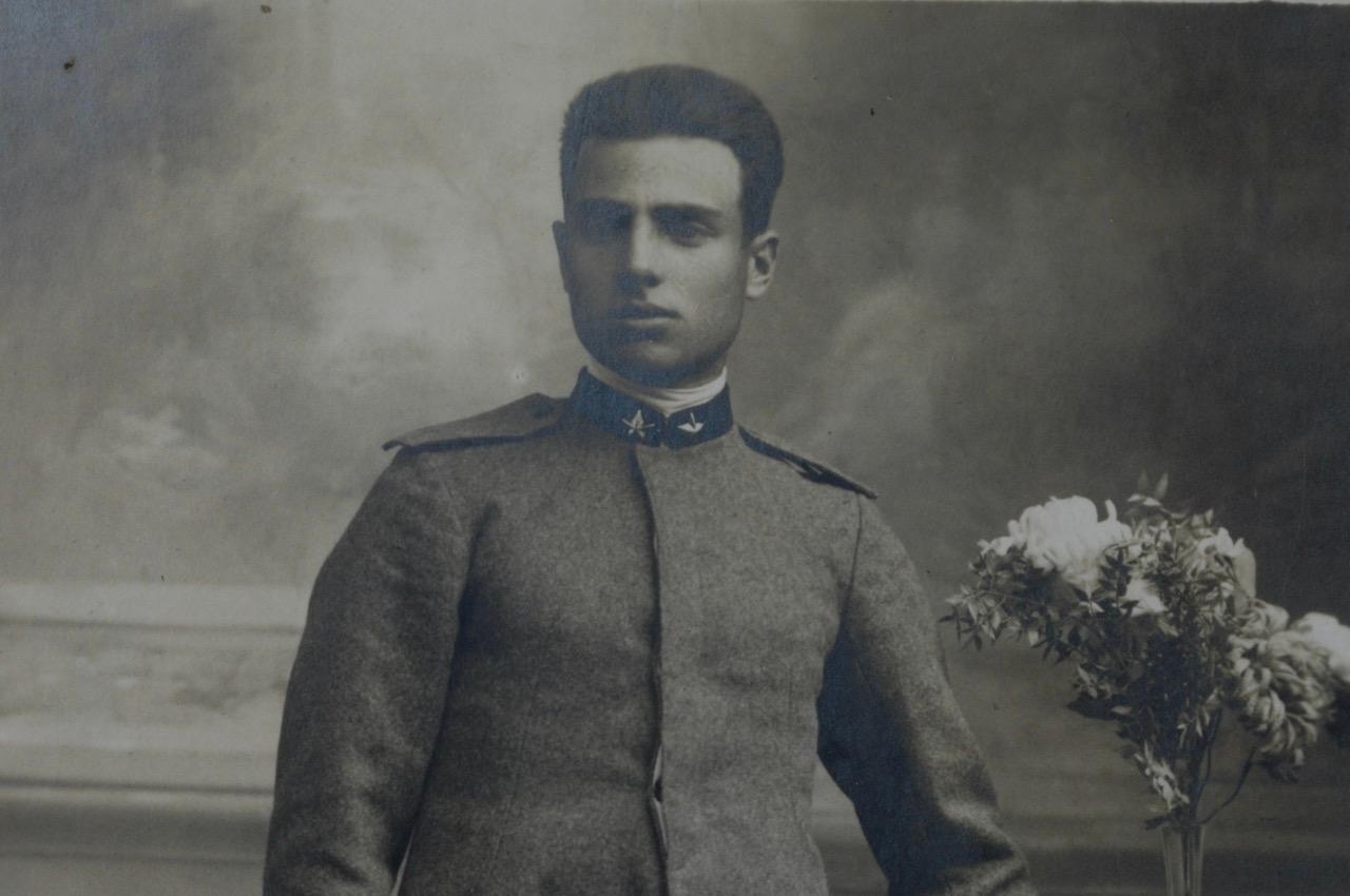 black-and-white photo of a man in a military uniform