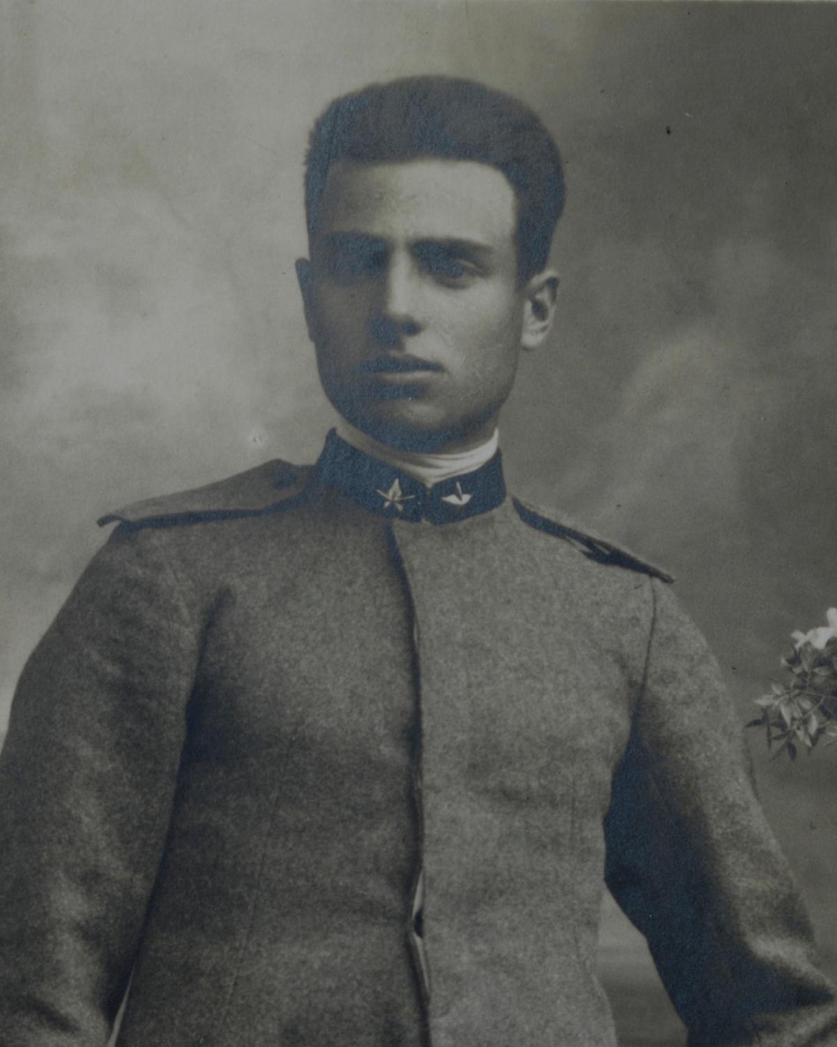 black-and-white photo of a man in a military uniform