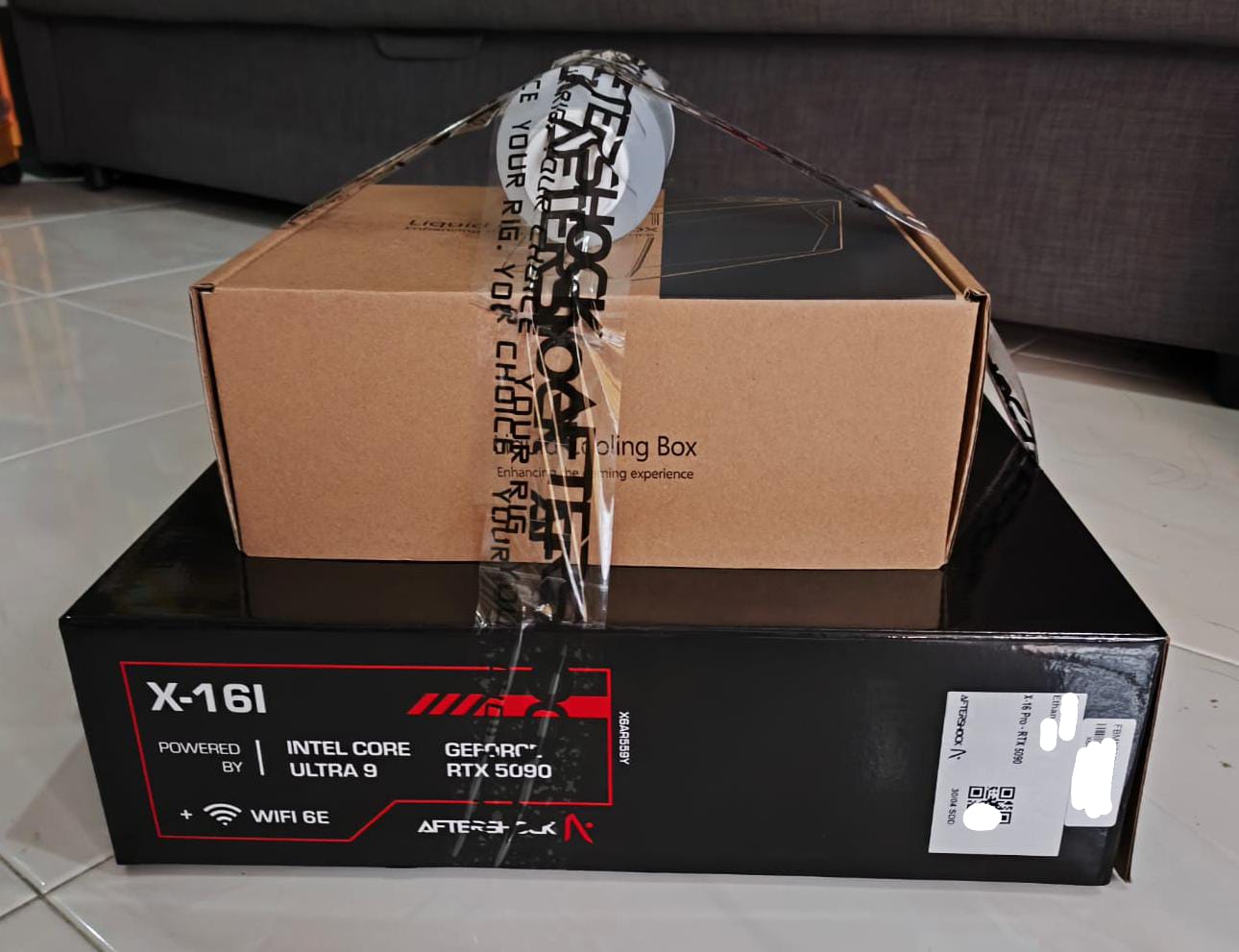 Image of a delivery package containing the new laptop