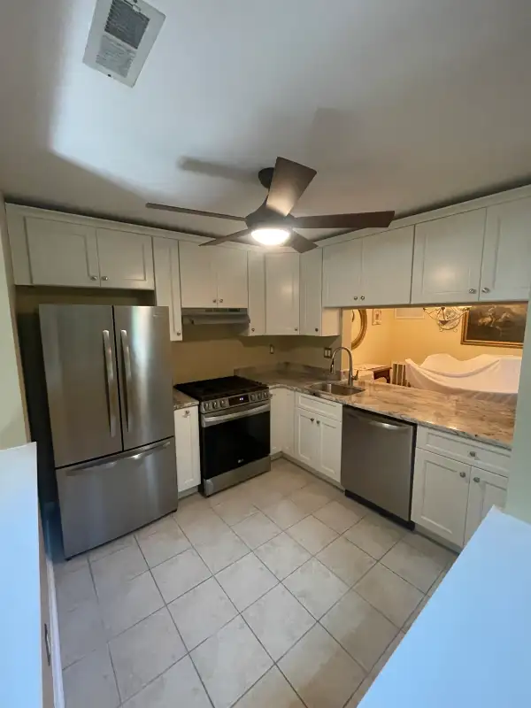 Lumberton, NJ Kitchen Cabinet Replacement & Full Renovation — White Shaker Cabinetry, Natural Granite Countertops, Undermount Sink, Stainless Steel Appliance Suite & Updated Tile Flooring