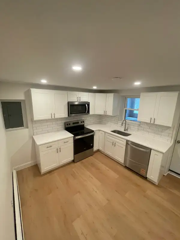 Shamong, NJ Full Kitchen Renovation — Custom White Shaker Cabinetry, Calacatta Quartz Countertops, White Subway Tile Backsplash, Stainless Steel Appliance Suite & Wide-Plank Hardwood Flooring