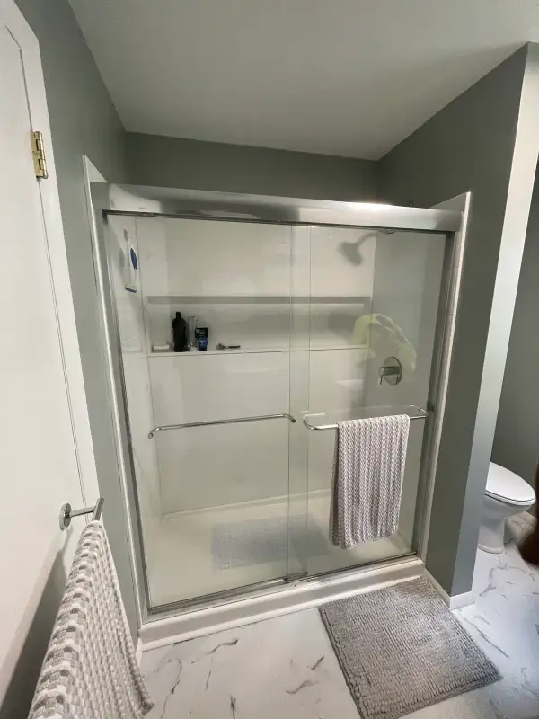 Leisuretown, NJ Full Bathroom Gut Renovation — Walk-In Shower with Frameless Sliding Glass Doors, Porcelain Marble-Look Tile Flooring & Chrome Fixture Package