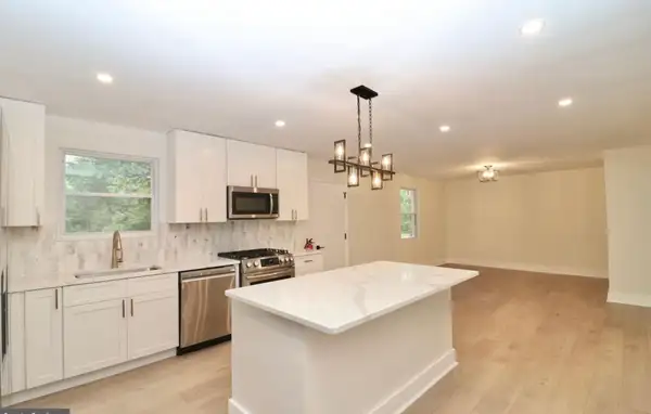 Sicklerville, NJ Total Kitchen Gut Renovation & Open-Concept Transformation — Quartz Island, Custom White Shaker Cabinetry, Marble Mosaic Backsplash & Stainless Steel Appliance Suite