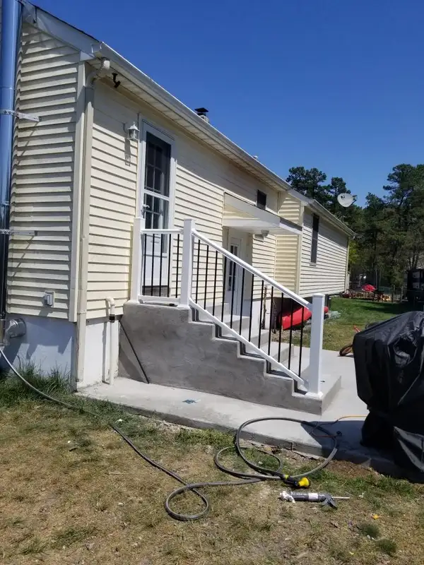 Concrete Porch Platform & Stair Construction with Aluminum Baluster Railing System | Exterior Entry Rebuild | Egg Harbor Township, NJ