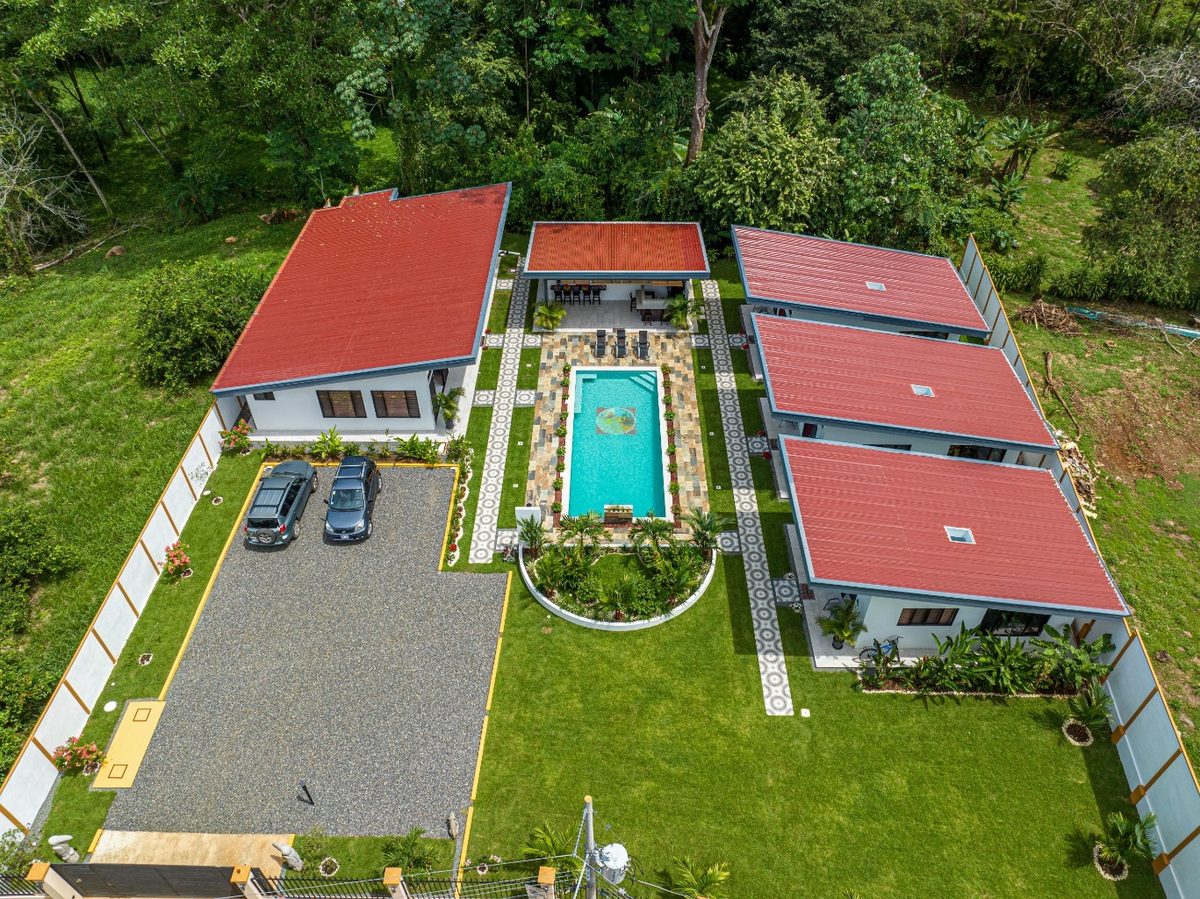 Incredible turnkey investment opportunity, 3 Rental villas, and a 2 Bedroom Home with a large pool.