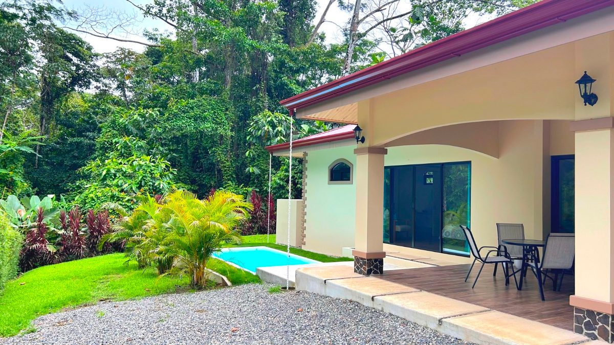Brand-New Home Backing Protected Rainforest Single Level Tropical Home