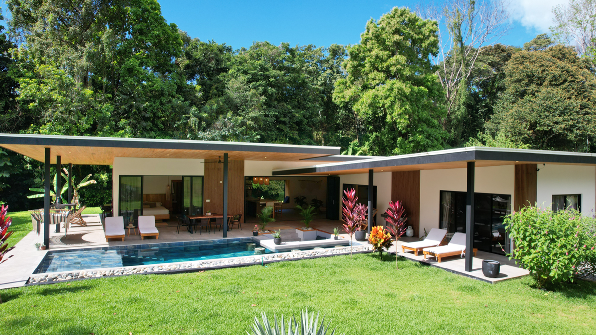 Stunning New Modern Home in Ojochal – Usable Lot Surrounded by Jungle and Creeks