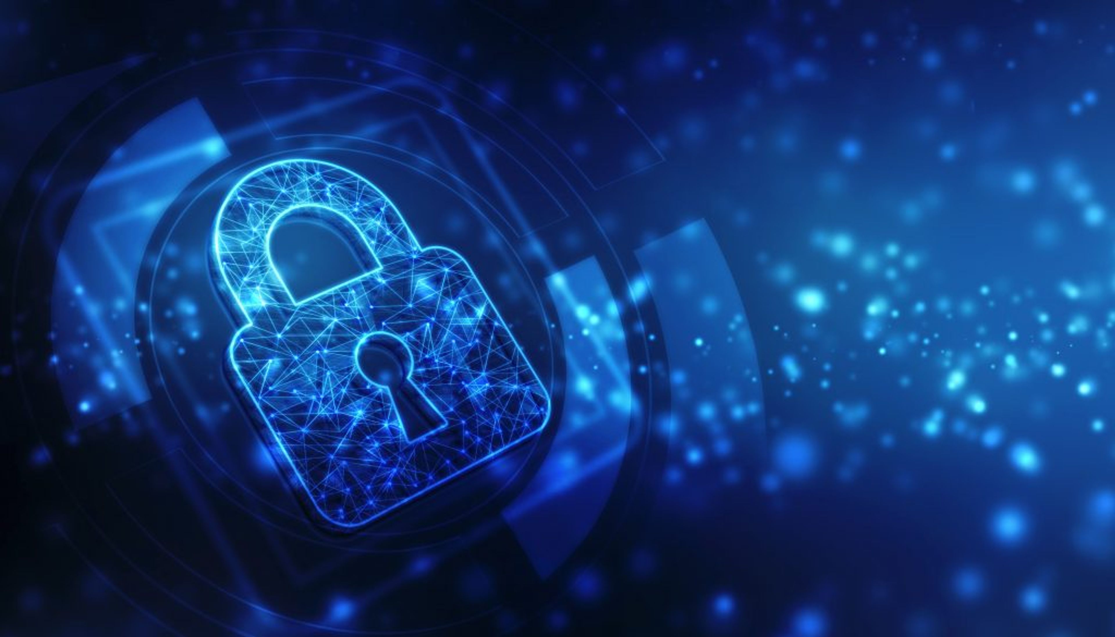 A padlock over a glowing digital fingerprint on a screen, symbolizing personal data protection and privacy in the digital age.