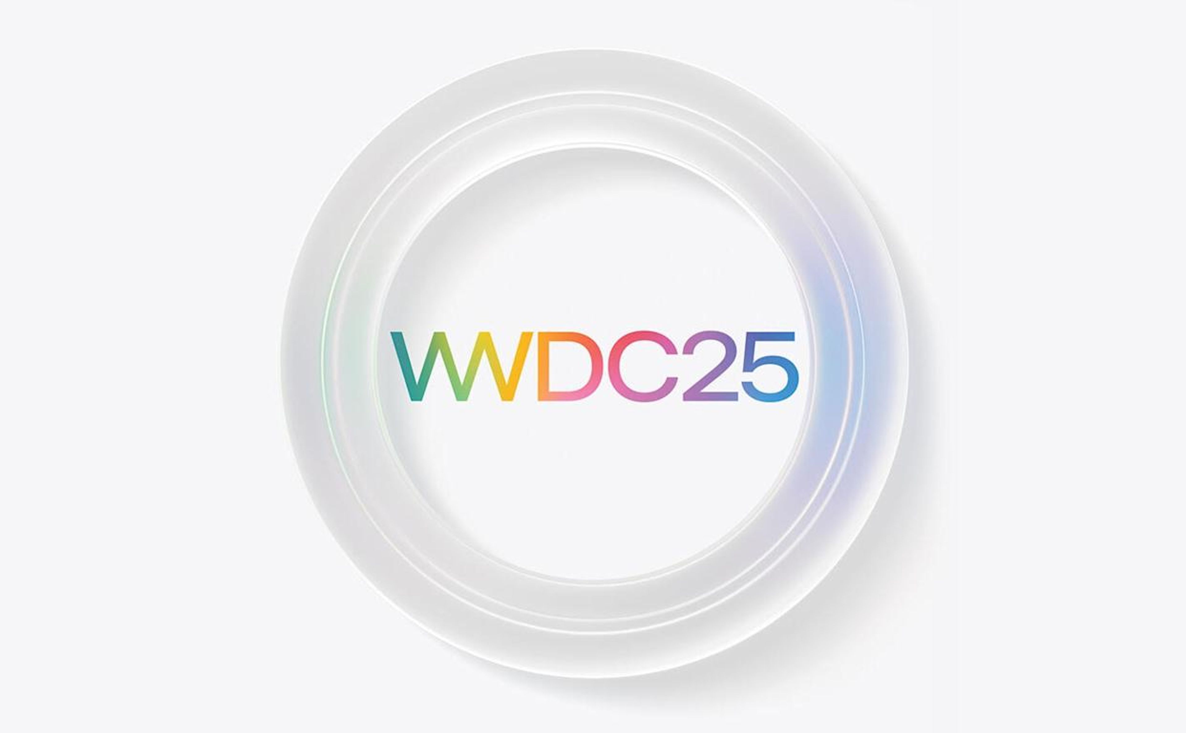 Apple’s iconic stage setup with glowing logos and developer-centric visuals, teasing new software reveals at WWDC 2025. Apple WWDC 2025