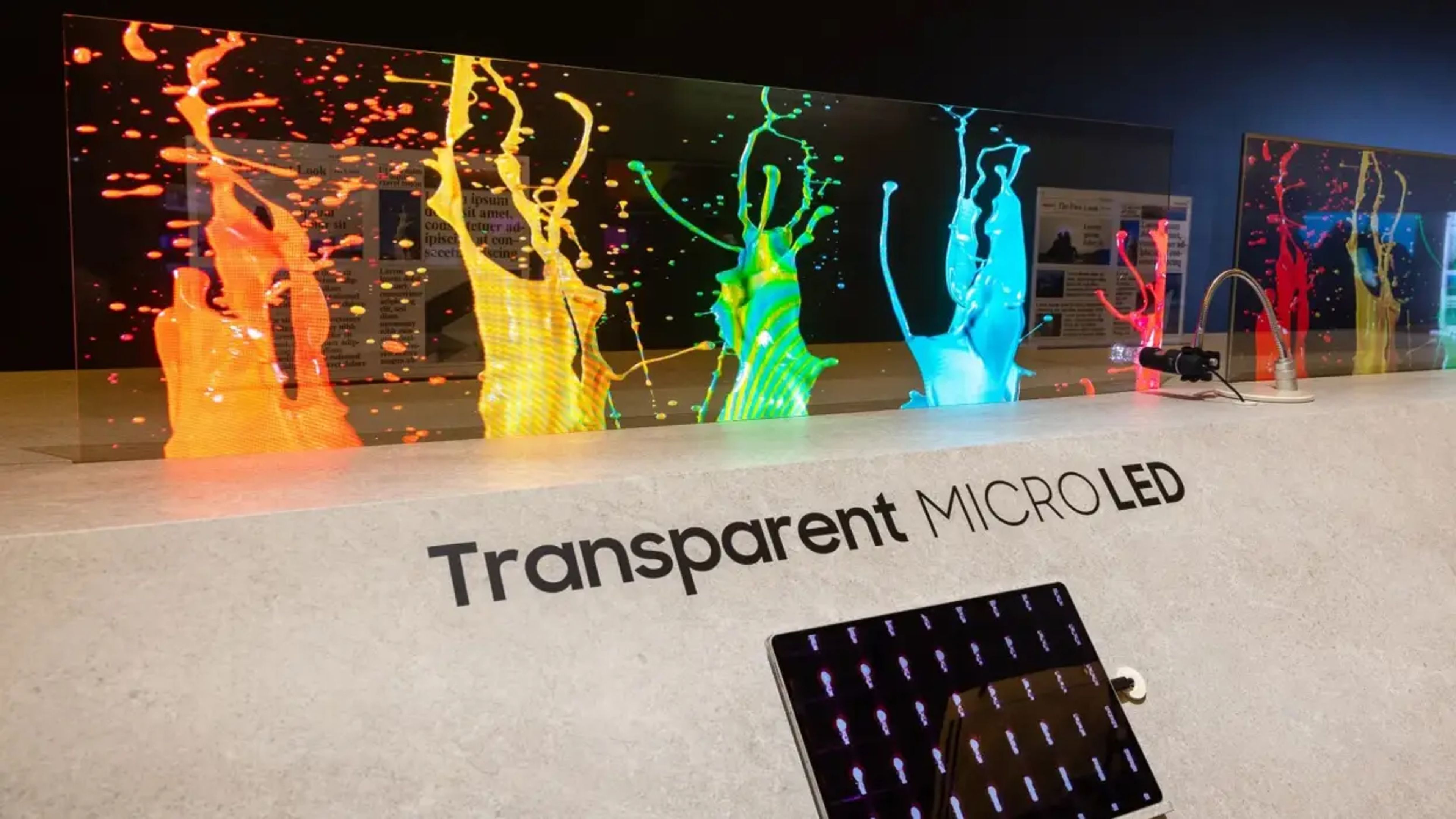 Transparent Micro LED display showcased at CES 2024, featuring a frameless, glass-like design with vivid imagery.
